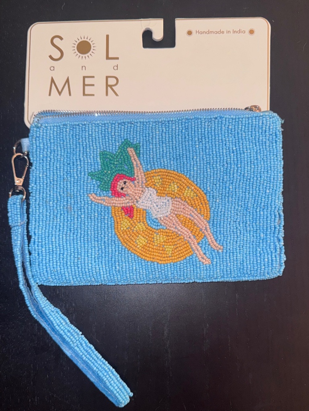 Sol and Mer - Beaded Wristlet With Redheaded Woman on Inner Tube - NWT